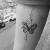 Fineline Tattoo Schmetterling Arm Black and Grey Tattoos Köln Tatöwierer Tattoostudio Art MF